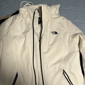 North face white coat.  Very nice material. Removable hood.